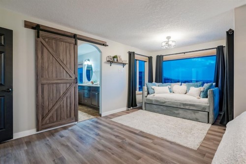 203 Sunset Circle, Cochrane, AB - Indoor Photo Showing Bedroom