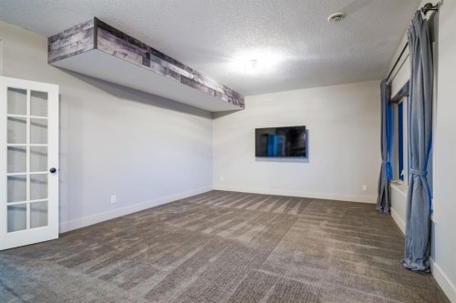203 Sunset Circle, Cochrane, AB - Indoor Photo Showing Other Room