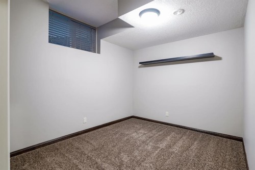 203 Sunset Circle, Cochrane, AB - Indoor Photo Showing Other Room