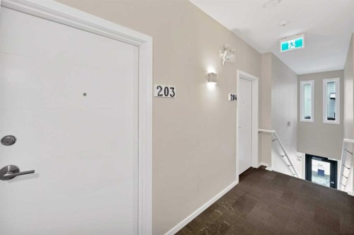 203-350 Redstone Ne, Calgary, AB - Indoor Photo Showing Other Room