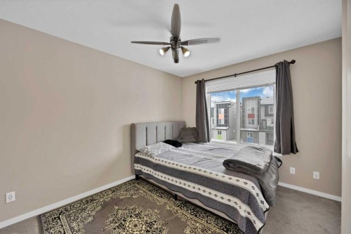 203-350 Redstone Ne, Calgary, AB - Indoor Photo Showing Bedroom