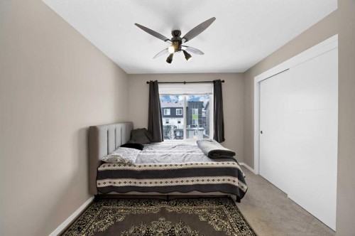 203-350 Redstone Ne, Calgary, AB - Indoor Photo Showing Bedroom