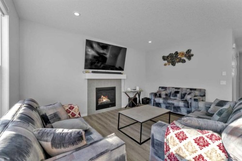 130 Red Sky Crescent Ne, Calgary, AB - Indoor Photo Showing Living Room With Fireplace