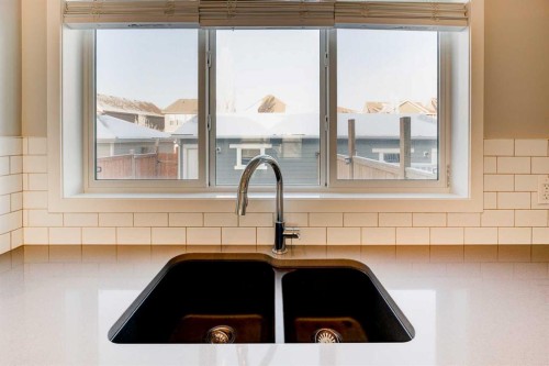 8036 Masters Boulevard, Calgary, AB - Indoor Photo Showing Kitchen With Double Sink
