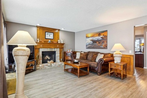16 Bedwood Rise Ne, Calgary, AB - Indoor Photo Showing Living Room With Fireplace