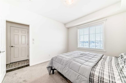 4301-215 Legacy Boulevard Se, Calgary, AB - Indoor Photo Showing Bedroom