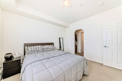 4301-215 Legacy Boulevard Se, Calgary, AB - Indoor Photo Showing Bedroom