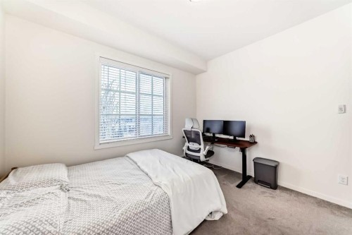 4301-215 Legacy Boulevard Se, Calgary, AB - Indoor Photo Showing Bedroom