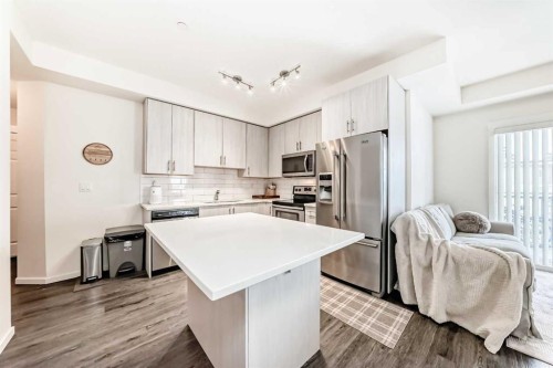 4301-215 Legacy Boulevard Se, Calgary, AB - Indoor Photo Showing Kitchen With Upgraded Kitchen