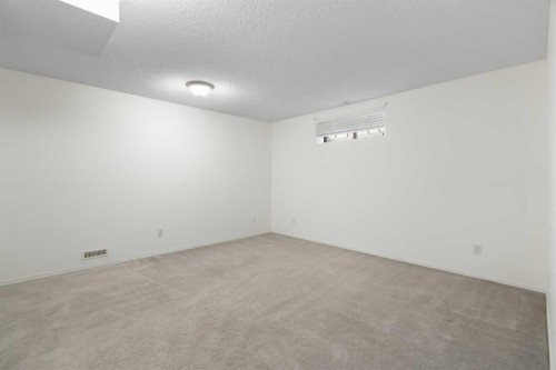 154 Arbour Crest Circle Nw, Calgary, AB - Indoor Photo Showing Other Room