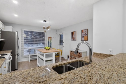 643 Strathcona Drive Sw, Calgary, AB - Indoor Photo Showing Kitchen With Double Sink