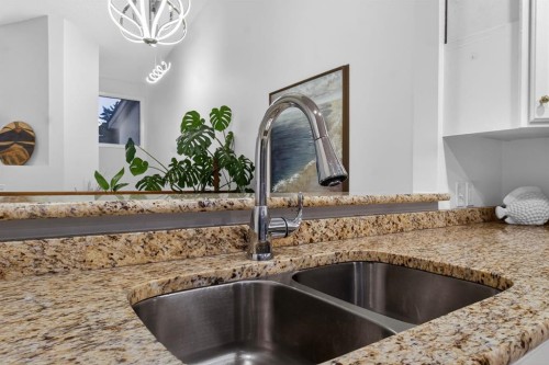 643 Strathcona Drive Sw, Calgary, AB - Indoor Photo Showing Kitchen With Double Sink
