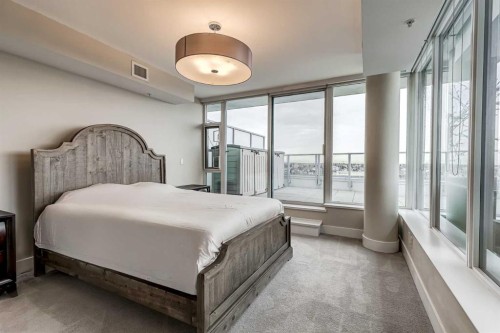 1802-519 Riverfront Avenue Se, Calgary, AB - Indoor Photo Showing Bedroom