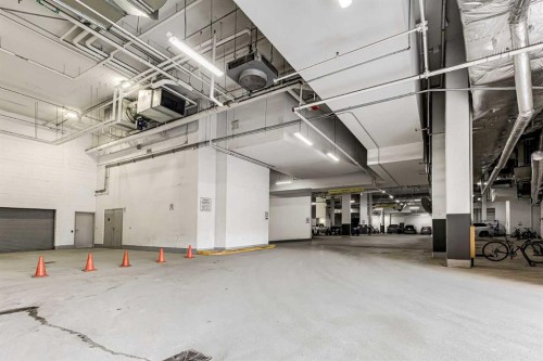 1802-519 Riverfront Avenue Se, Calgary, AB - Indoor Photo Showing Garage