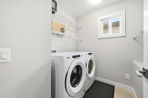 4 Cornergate Place Ne, Calgary, AB - Indoor Photo Showing Laundry Room