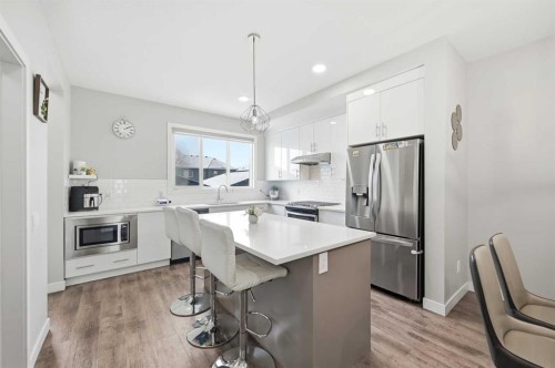4 Cornergate Place Ne, Calgary, AB - Indoor Photo Showing Kitchen With Stainless Steel Kitchen With Upgraded Kitchen