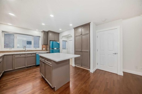 79 Saddlebrook Way Ne, Calgary, AB - Indoor Photo Showing Kitchen With Double Sink