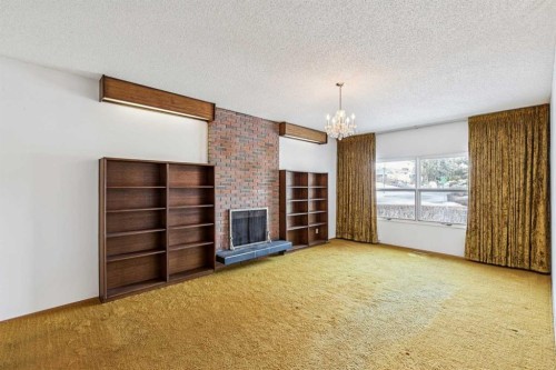 272 Thames Close Nw, Calgary, AB - Indoor With Fireplace
