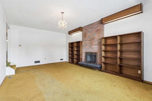 272 Thames Close Nw, Calgary, AB - Indoor With Fireplace