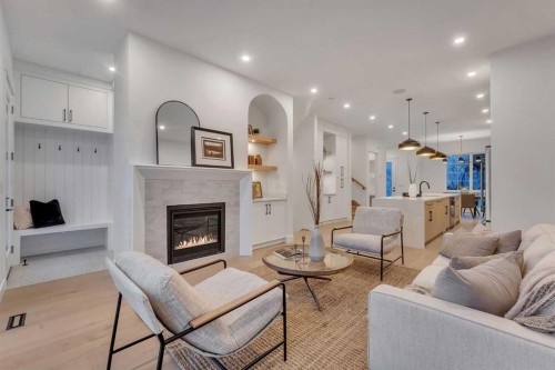 223 29 Avenue Nw, Calgary, AB - Indoor Photo Showing Living Room With Fireplace