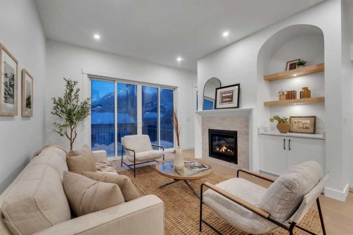 223 29 Avenue Nw, Calgary, AB - Indoor Photo Showing Living Room With Fireplace