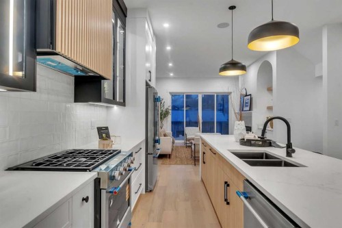 223 29 Avenue Nw, Calgary, AB - Indoor Photo Showing Kitchen With Stainless Steel Kitchen With Double Sink With Upgraded Kitchen