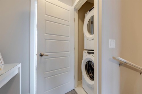 19 Sage Bluff Gate Nw, Calgary, AB - Indoor Photo Showing Laundry Room