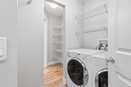 32 Evanscove Heights Nw, Calgary, AB - Indoor Photo Showing Laundry Room