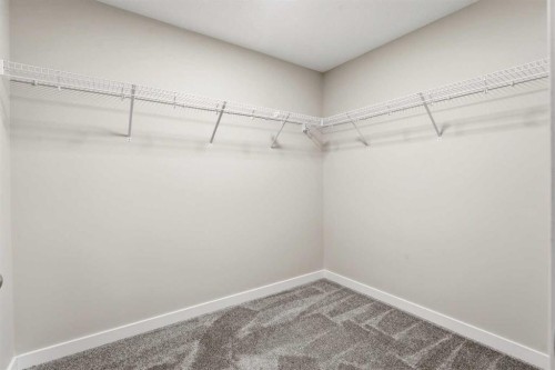 32 Evanscove Heights Nw, Calgary, AB - Indoor With Storage