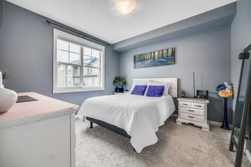 140 Cranford Walk Se, Calgary, AB - Indoor Photo Showing Bedroom