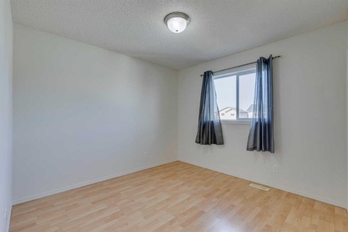 228 Luxstone Place Sw, Airdrie, AB - Indoor Photo Showing Other Room