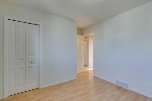 228 Luxstone Place Sw, Airdrie, AB - Indoor Photo Showing Other Room