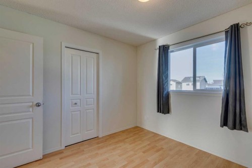 228 Luxstone Place Sw, Airdrie, AB - Indoor Photo Showing Other Room