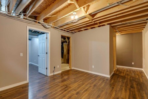 228 Luxstone Place Sw, Airdrie, AB - Indoor Photo Showing Basement