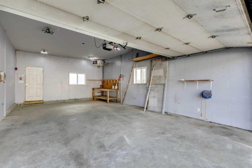 228 Luxstone Place Sw, Airdrie, AB - Indoor Photo Showing Garage