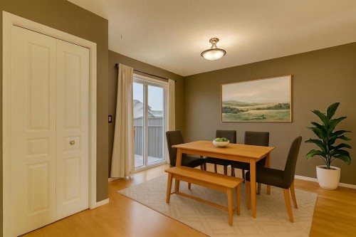228 Luxstone Place Sw, Airdrie, AB - Indoor Photo Showing Dining Room