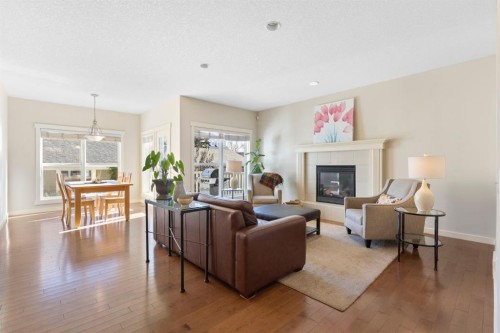 5550 Henwood Street Sw, Calgary, AB - Indoor Photo Showing Living Room With Fireplace