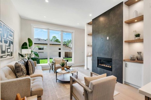 1130A Regent Crescent Ne, Calgary, AB - Indoor Photo Showing Living Room With Fireplace
