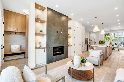 1130A Regent Crescent Ne, Calgary, AB - Indoor Photo Showing Living Room With Fireplace