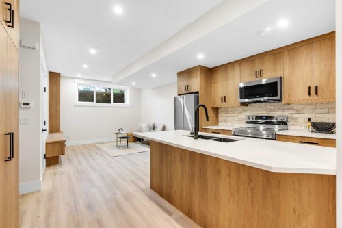 1130A Regent Crescent Ne, Calgary, AB - Indoor Photo Showing Kitchen With Double Sink With Upgraded Kitchen