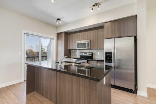 155 Silverado Common Sw, Calgary, AB - Indoor Photo Showing Kitchen With Stainless Steel Kitchen With Upgraded Kitchen
