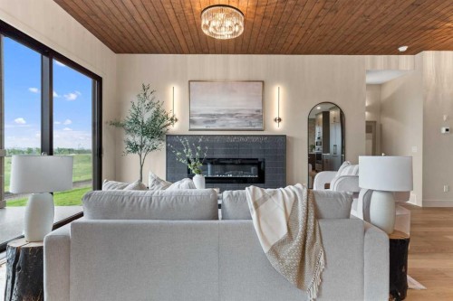 8 Westmount Point, Okotoks, AB - Indoor Photo Showing Living Room With Fireplace