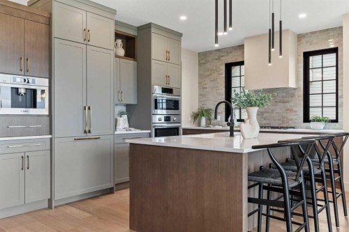 8 Westmount Point, Okotoks, AB - Indoor Photo Showing Kitchen With Upgraded Kitchen