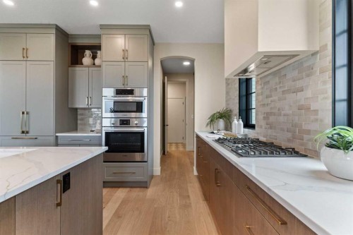 8 Westmount Point, Okotoks, AB - Indoor Photo Showing Kitchen With Upgraded Kitchen
