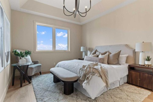 8 Westmount Point, Okotoks, AB - Indoor Photo Showing Bedroom