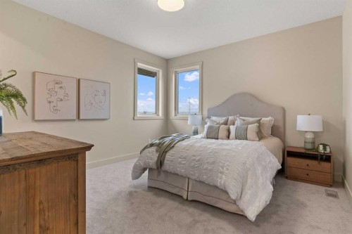 8 Westmount Point, Okotoks, AB - Indoor Photo Showing Bedroom