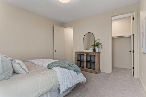 8 Westmount Point, Okotoks, AB - Indoor Photo Showing Bedroom