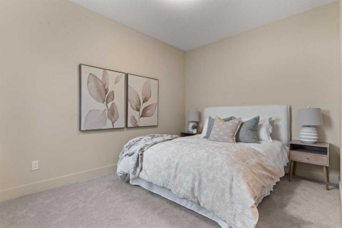 8 Westmount Point, Okotoks, AB - Indoor Photo Showing Bedroom