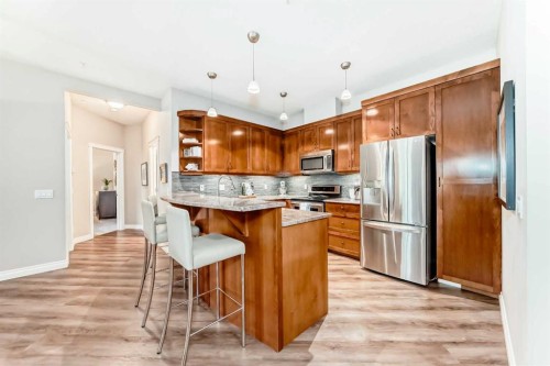 7204-14 Hemlock Crescent Sw, Calgary, AB - Indoor Photo Showing Kitchen With Stainless Steel Kitchen