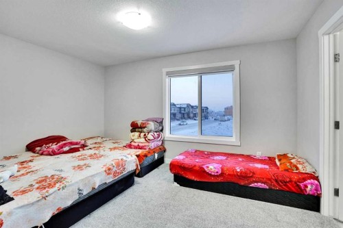 14 Belvedere Common Se, Calgary, AB - Indoor Photo Showing Bedroom